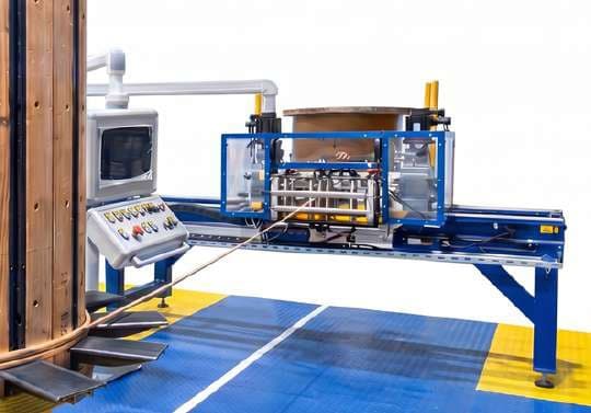 Vertical coil winding machine installed in transformer factory